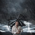 Broken umbrella in storm