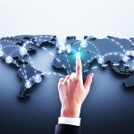 hand on world map