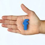 Facebook in palm