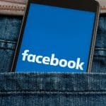 Facebook on mobile in pocket