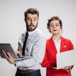Couple with laptops