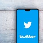 Twitter and white wood backrgound