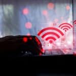 Laptop with red Wi-Fi logos