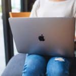 Woman using MacBook Pro