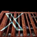 Twitter X logo projected onto building
