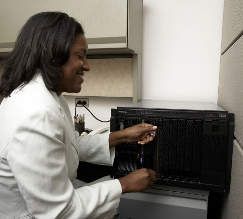 IBM's BladeServer S cluster rests comfortably on a client's cubicle desktop.